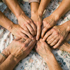 Hands on a Tablecloth