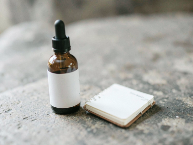 Dropper Bottle and Notebook