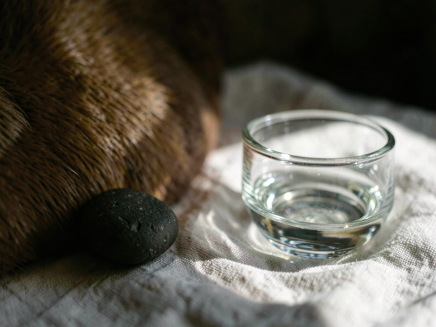 Pebble, Water, Linen Still Life