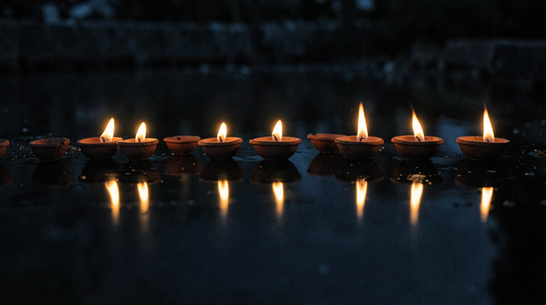 Diya Flames Dance on Water