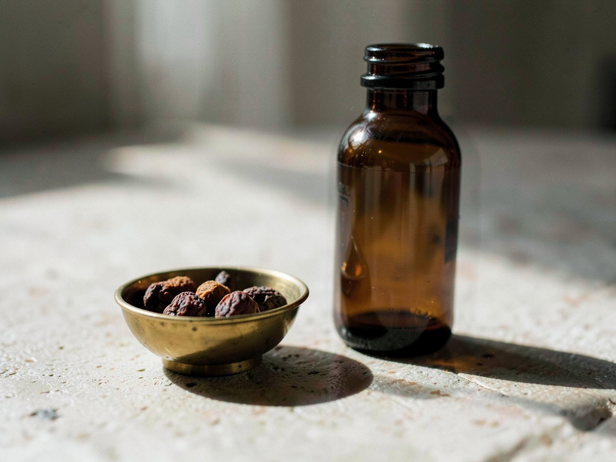 Amla Berries and Amber Bottle