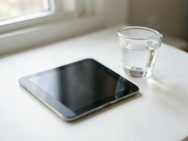 Tablet and Water Still Life