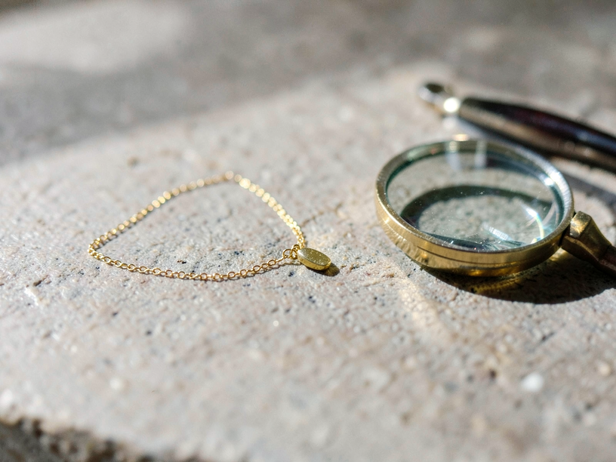 Gold Pendant and Loupe