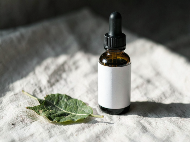 Dropper bottle and leaf