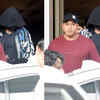 Shah Rukh Khan hides face behind mask and hoodie as he gets spotted at ...